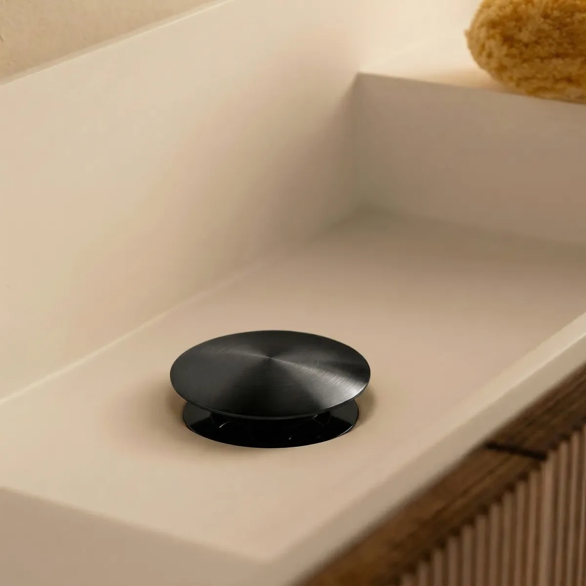 Bouchon de vidange universel noir à clic-clac pour éviers