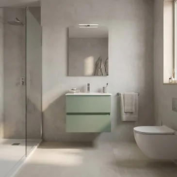 Meuble de salle de bain suspendu vert sauge avec finition côtelée, miroir et éclairage assortis