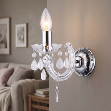 applique in cristallo disponibile in 3 varianti con attacco E14, per impreziosire pareti di soggiorni e camere da letto.